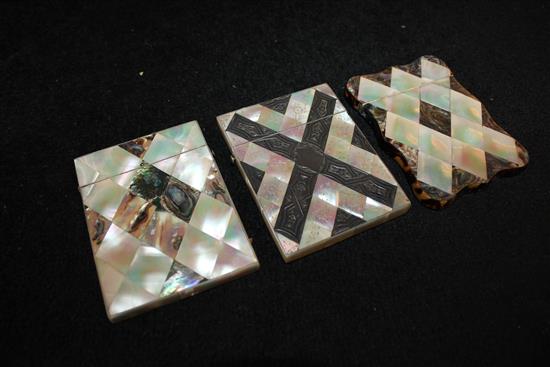 Two abalone and mother of pearl card cases (one tortoiseshell-edged) & a white metal-inlaid engraved mother of pearl case